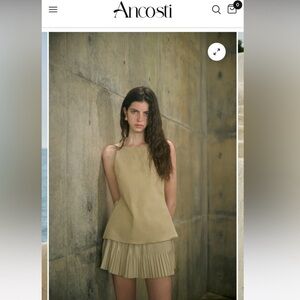 Ancosti Beige Sleeveless Top and Pleated Skirt Set
